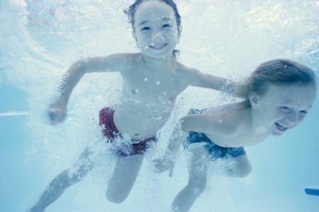 Kids swimming in maintained pool